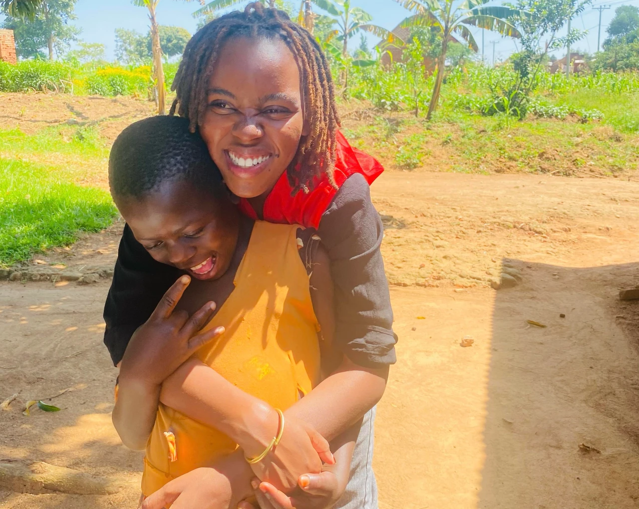 SheBloom Founder smiling with a girl